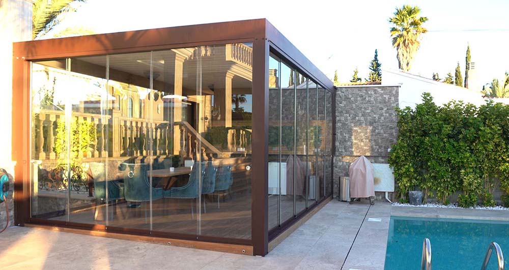 Bioclimatic Aluminium Pergola with LED lighting and sliding glass panels in Torrevieja